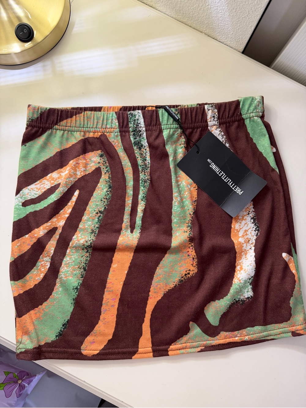 PrettyLittleThing Abstract Print Mini Skirt in Brown, Green & Orange